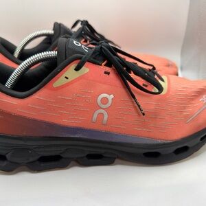 On Running Coral and Black Sneakers